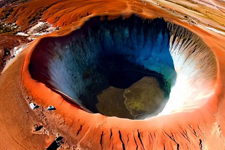 Volcanic crater from above → Eye blinking in close-up